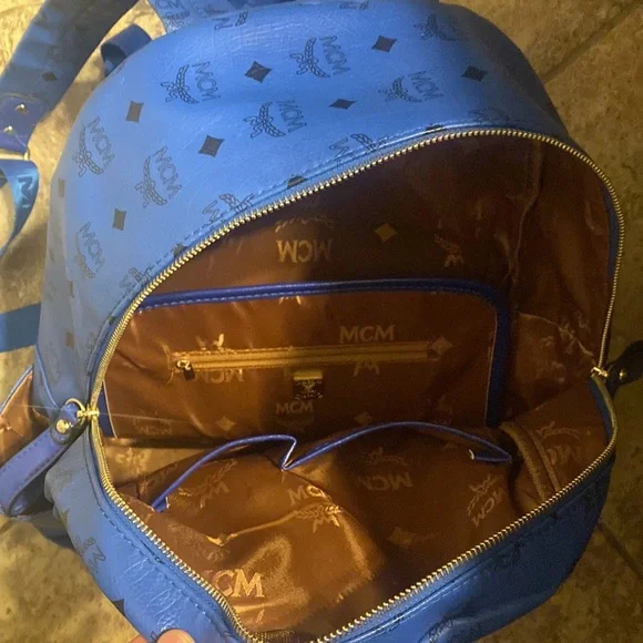 selling MCM backpack color is blue